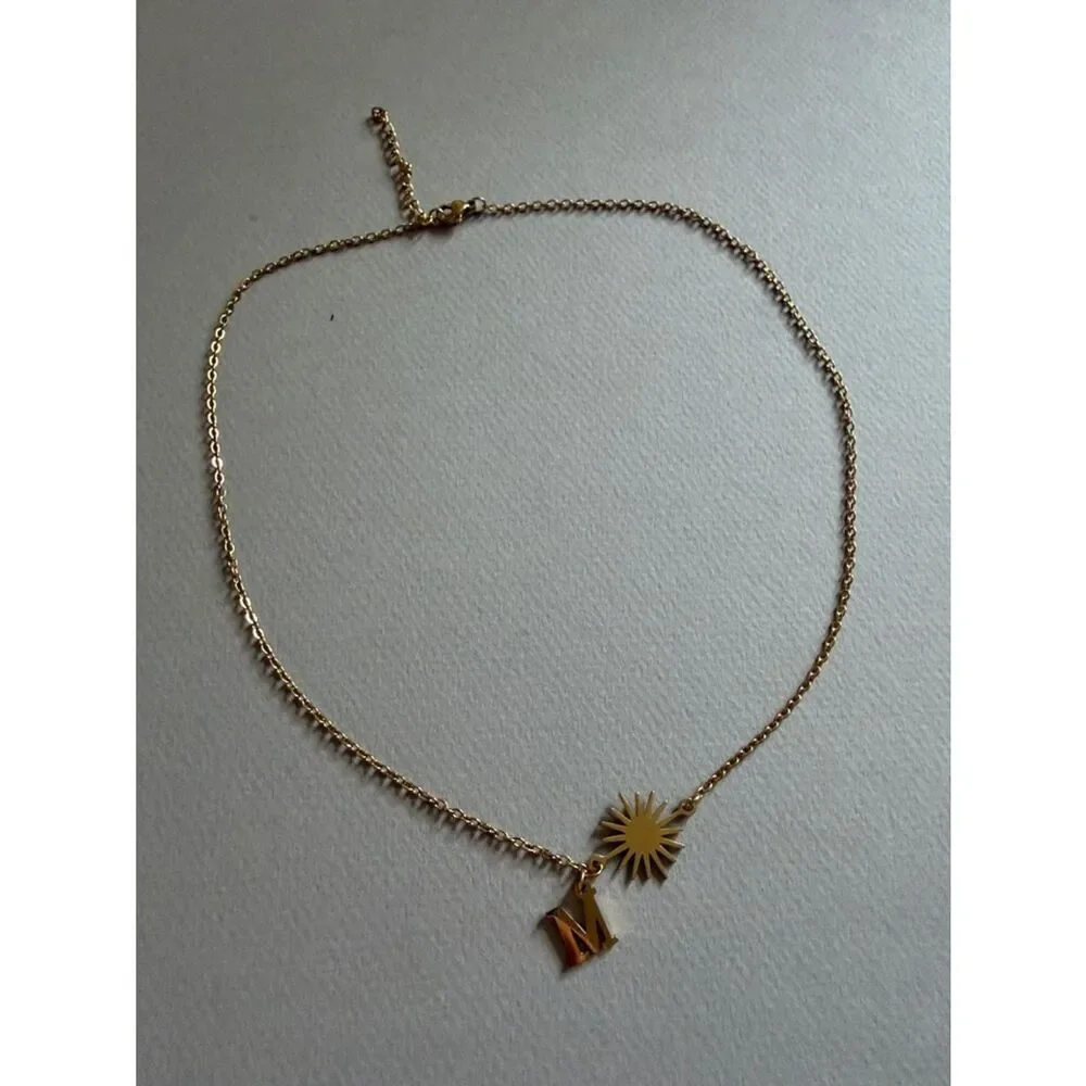 Anthropologie elegant gold